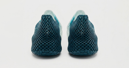 Pair of blue and white shoes on a light gray background