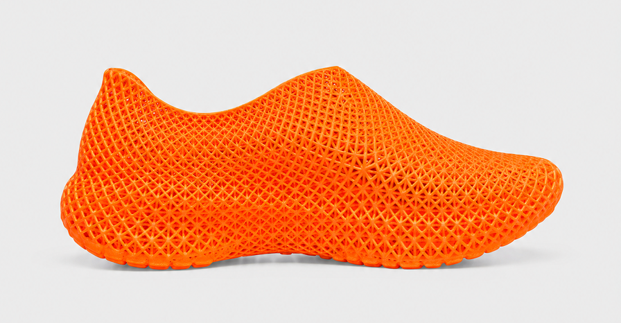 Orange mesh shoe on a light gray background