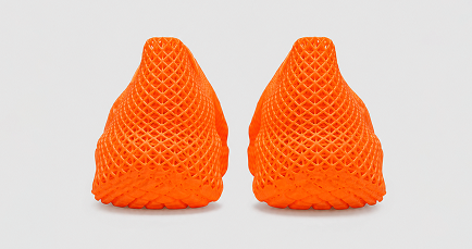 Two orange textured objects on a light gray background